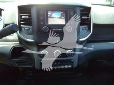 Dashboard of a 2024 Ram 4500 SLT showing central touchscreen with rear camera display and surrounding controls.