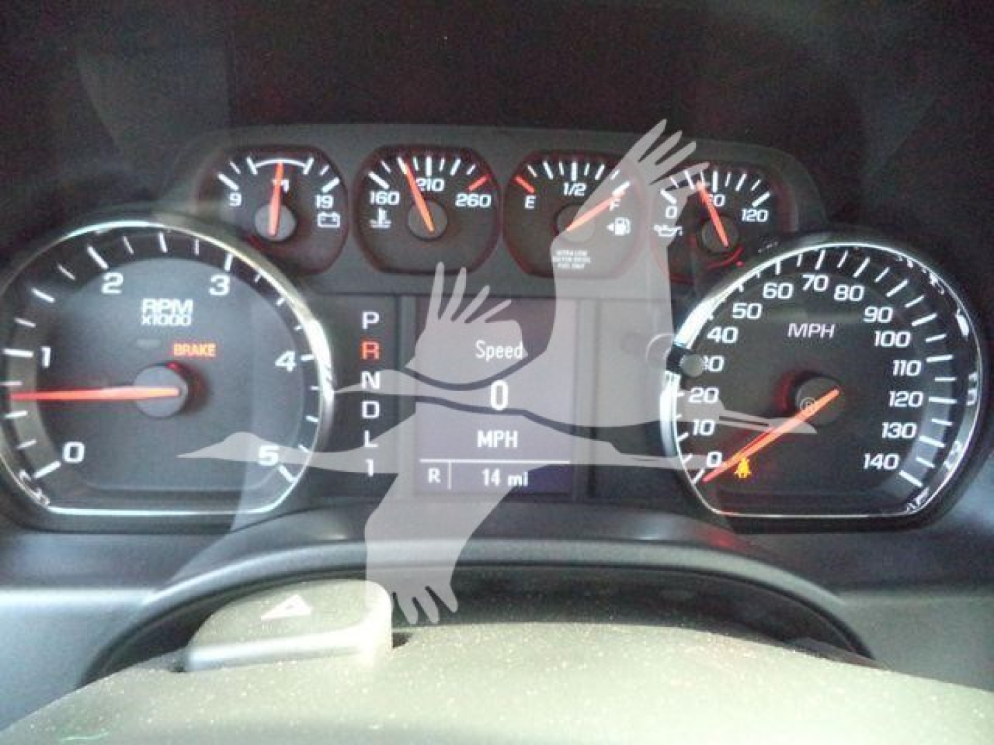 Dashboard view of a 2023 Chevrolet Silverado 6500HD showing instrument cluster with speedometer, tachometer, and gear indicator P R N D L.