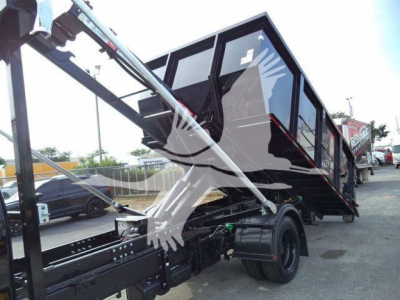Chevrolet Silverado 6500HD rollover truck cargo bed and hydraulic lift in-view showing side profile and truck chassis.