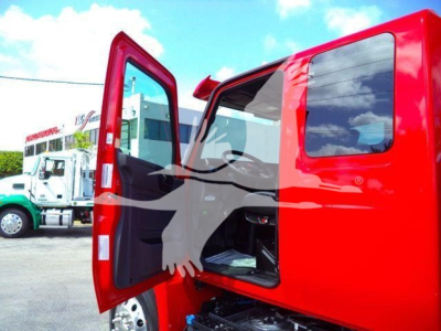 Truck cab interior with open door showing red exterior and black interior, MV607RED listing.