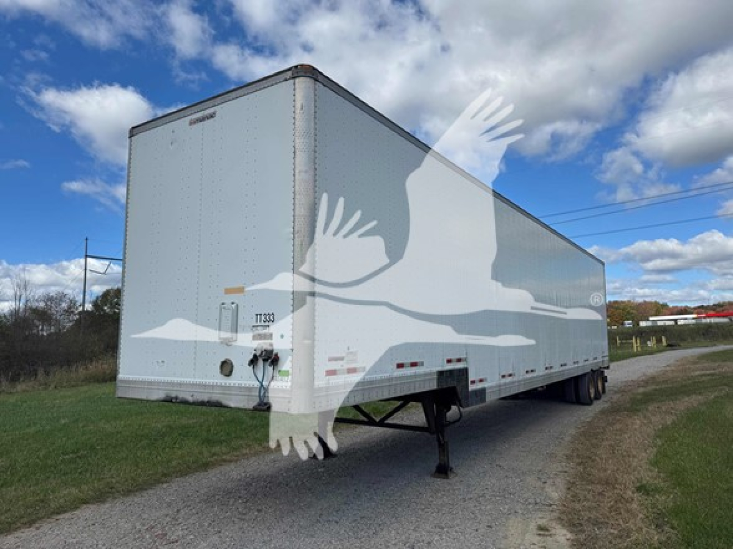 Manac 2015 48' drop deck trailer (van) in-service with leveled hitch, side rails, and rear doors, VIN 2M5921469F1148293, stock 7447.