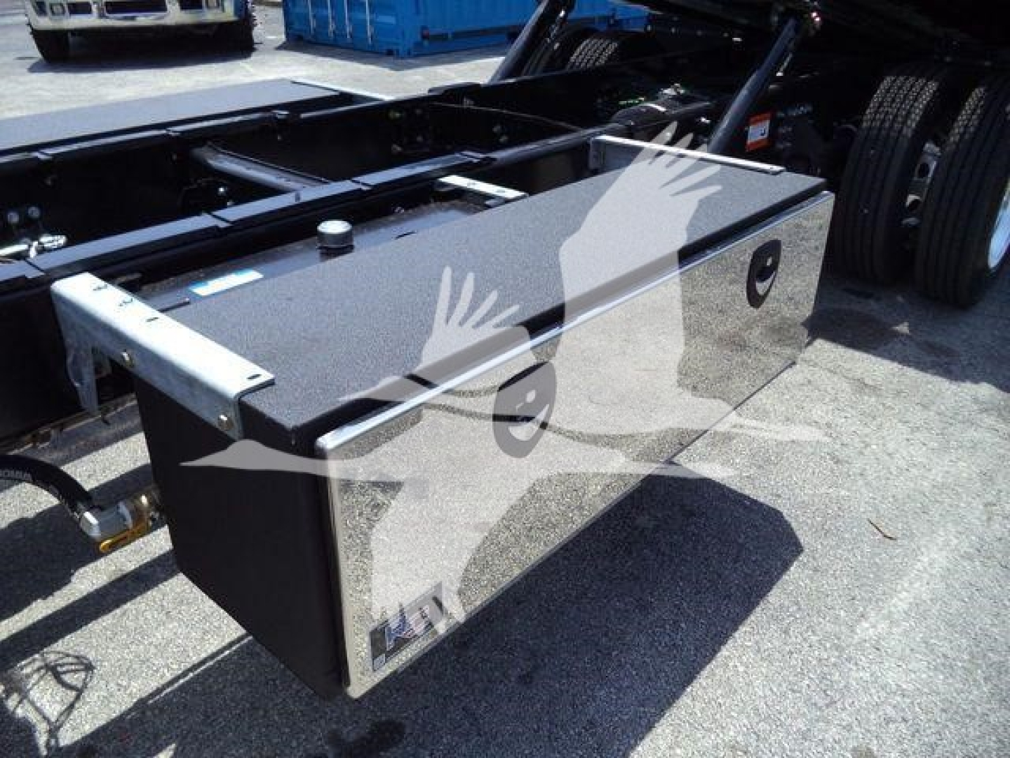 Rollick Mack MD6 fuel/auxiliary transverse toolbox mounted on truck frame with glossy black finish