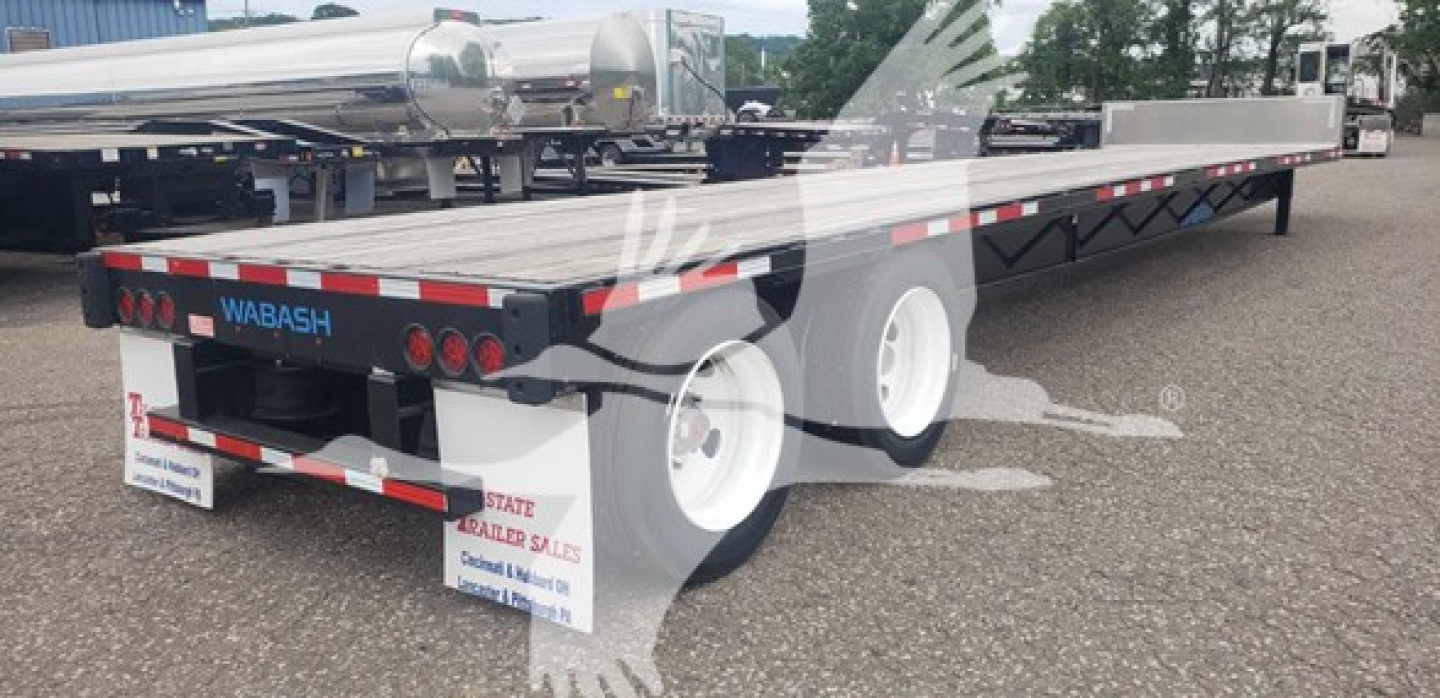 Wabash steel drop-closed tandem trailer showing rear and side; tilting tandem axles, black frame, red/white reflective tape, WABASH branding on rear; VIN tag visible