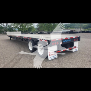 2024 Wabash Steel Drop-Closed Tandem trailer showing rear with WABASH branding, taillights, mudflaps, and dual axles.