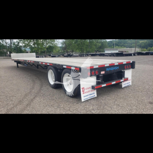 Wabash steel drop trailer with dual rear axles, showing brand name WABASH on tailgate, reflective striping, and mud flaps. Back shows lights, license plate area. Side is flatbed deck.
