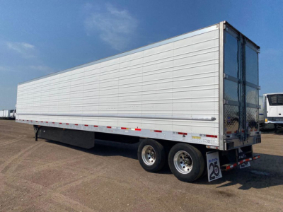 Trailer side view showing a white refrigerated utility trailer with tandem axles and rear doors, stock number  U91109, category Refrigerated.