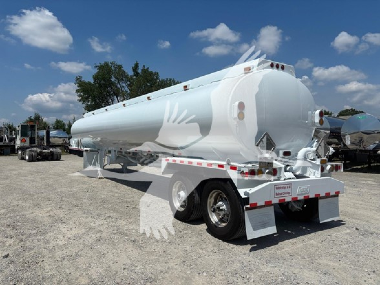 2020 Heil Compt DOT406 tanker trailer shown from rear-left side in a gravel lot.