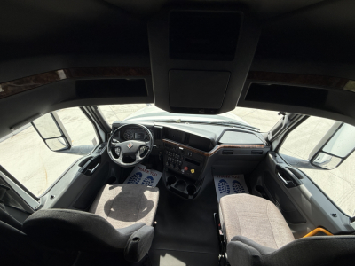 Cab interior of a 2022 International LT625 truck showing dashboard and front seats