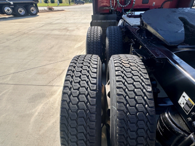 Peterbilt 579 truck chassis with dual rear axles and tires visible; no legible decals or labels clearly readable in this shot.