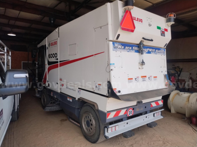 Elgin 6000 sweeper truck rear view showing model 6000 branding and safety markings.