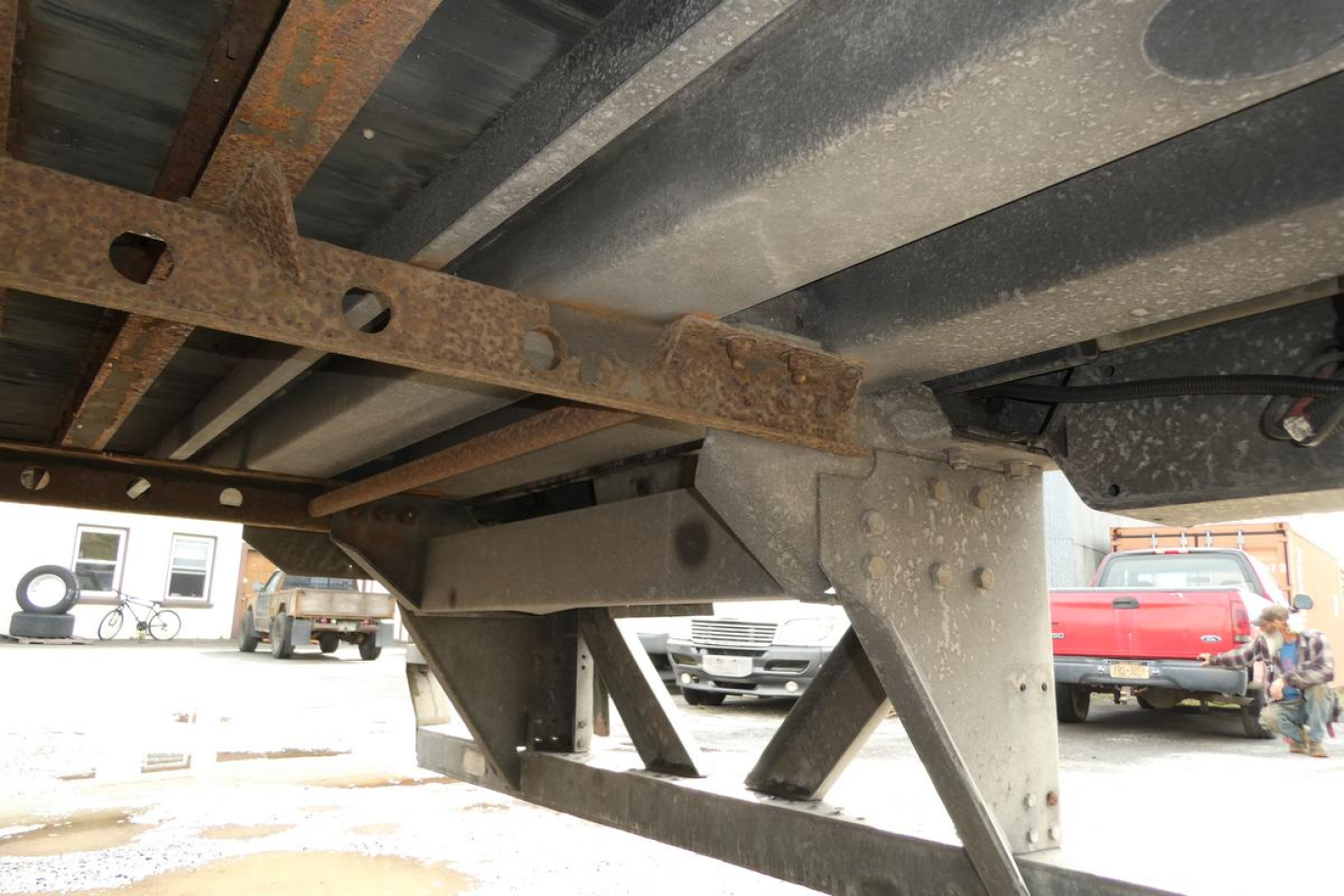 Trailer undercarriage showing steel frame and support brackets on Vanguard VXP trailer, rust-free metal components and structural cross members.