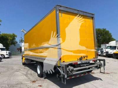 Box truck rear view showing bright yellow cargo and gray frame with hooped rear bumper.
