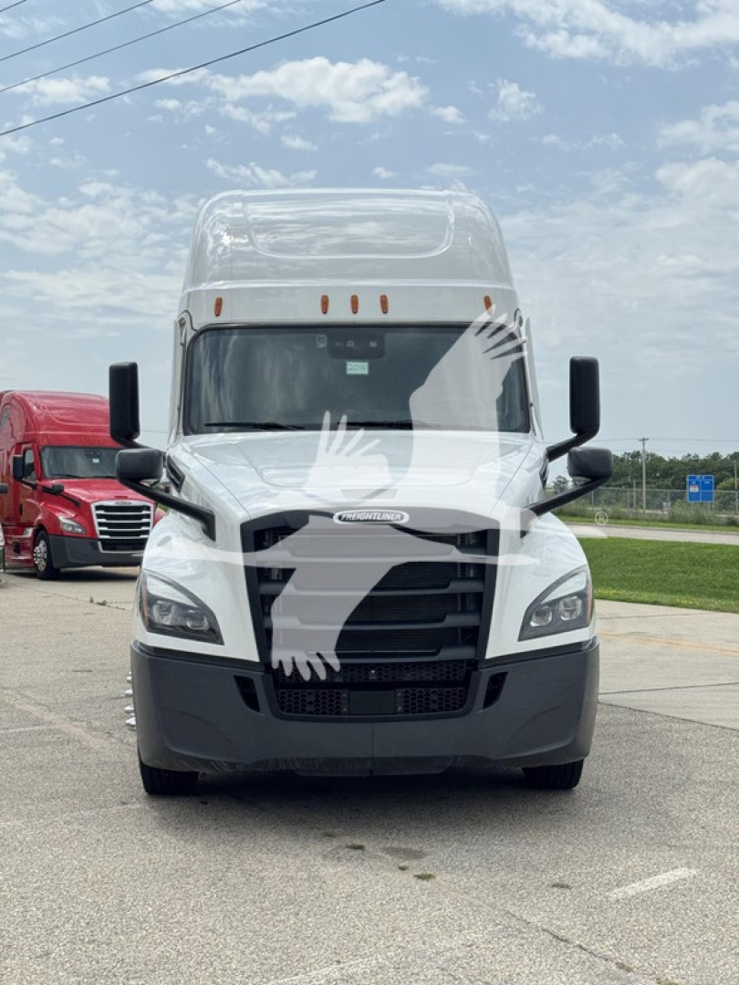 Front view of a 2022 Freightliner Cascadia 126 conventional sleeper truck in a parking lot.