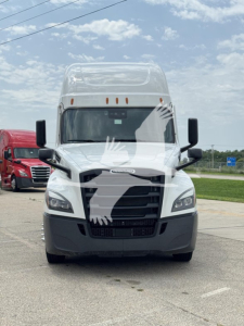 Front view of a 2022 Freightliner Cascadia 126 conventional sleeper truck in a parking lot.
