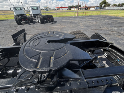 Front view of a 2027 Mack GR64FT undercarriage showing fifth wheel and suspension components.