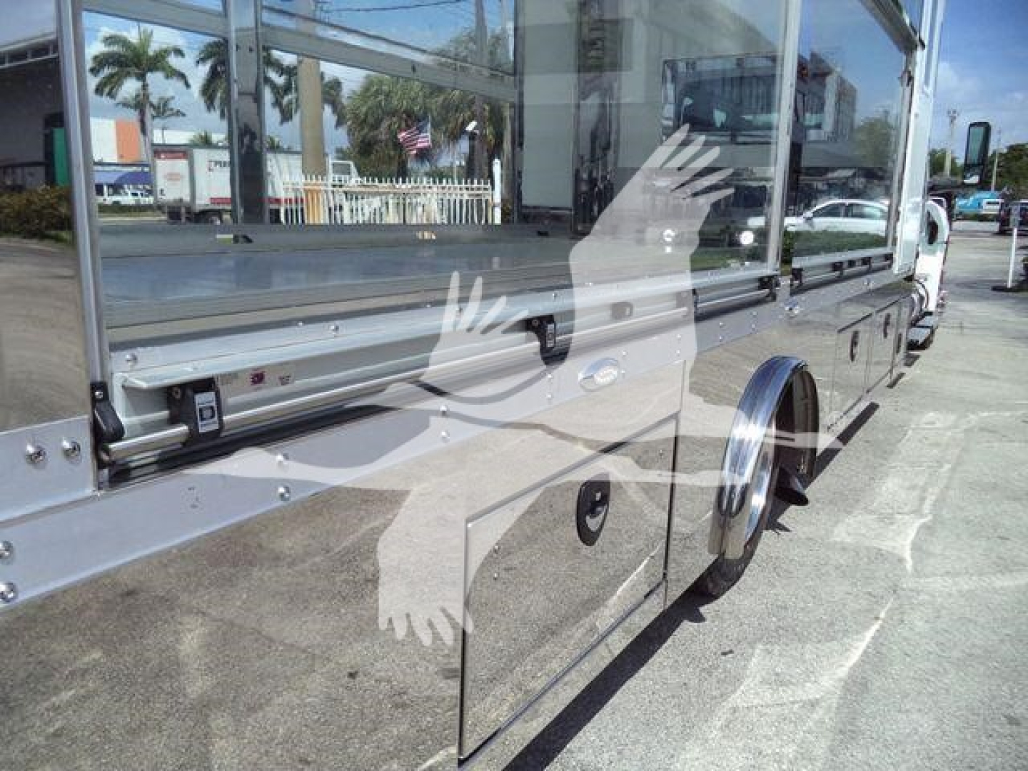MV Series truck rollback body side showing storage compartments and windows