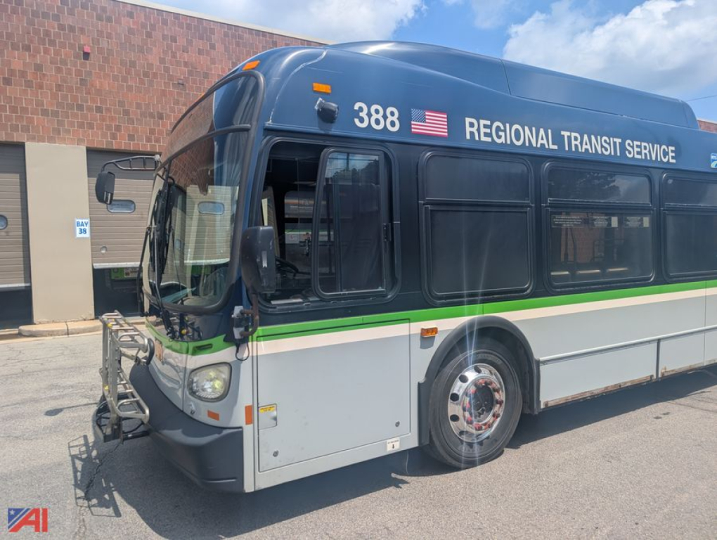 Bus front quarter showing XD60 transit bus with blue upper, green stripe, Regional Transit Service lettering, number 388.