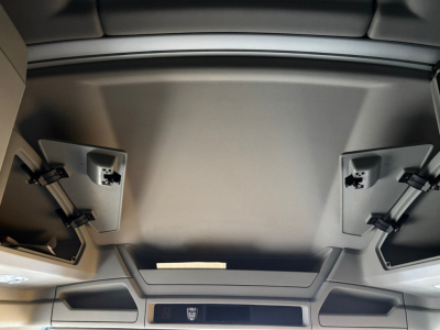 Kenworth T680 interior ceiling panels and hatch area in view from cabin, no visible text or labels.