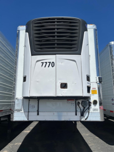 Rear view of a 2018 Utility 3000R W refrigerated trailer showing model number 7770 and access components.