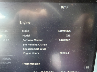 Engine information from Kenworth dash: Make Cummins, Model X15, Software Version 64702122, Engine Hours 10065.4, Emission Cert Level, Transmission. Temperature 82°F.