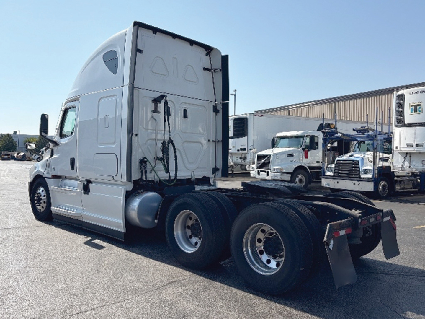 Freightliner Cascadia126 tractor cabin and rear chassis view with sleeper cab and dual rear axles.