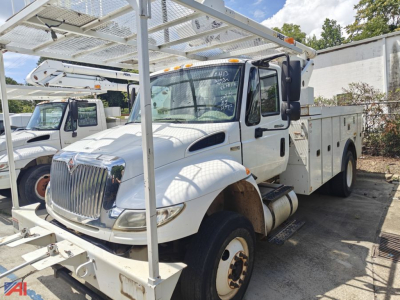 International 4400 bucket truck in-service cab with extended ladder rack and utility body, front grille visible, white exterior, side view
