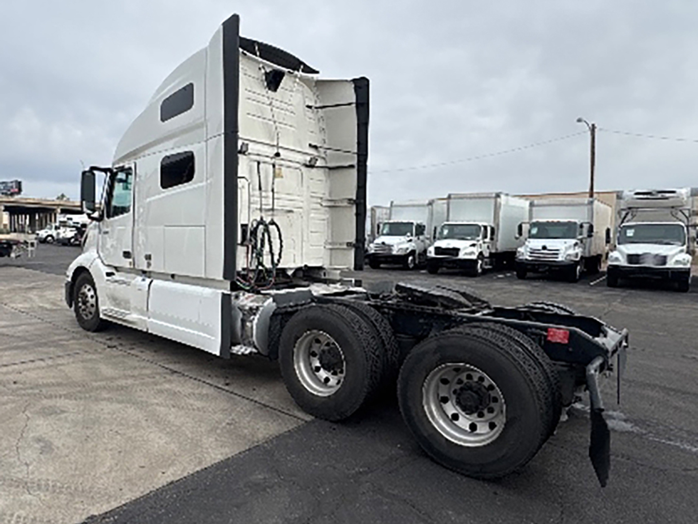 Volvo VNL 760 tractor rear view showing sleeper cab and dual rear axles