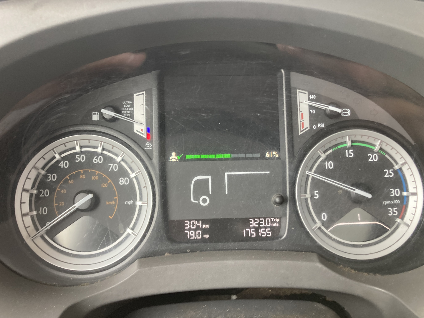 Peterbilt 2017 cabover instrument cluster showing speedometer, RPM gauge, fuel and engine indicators, and digital display