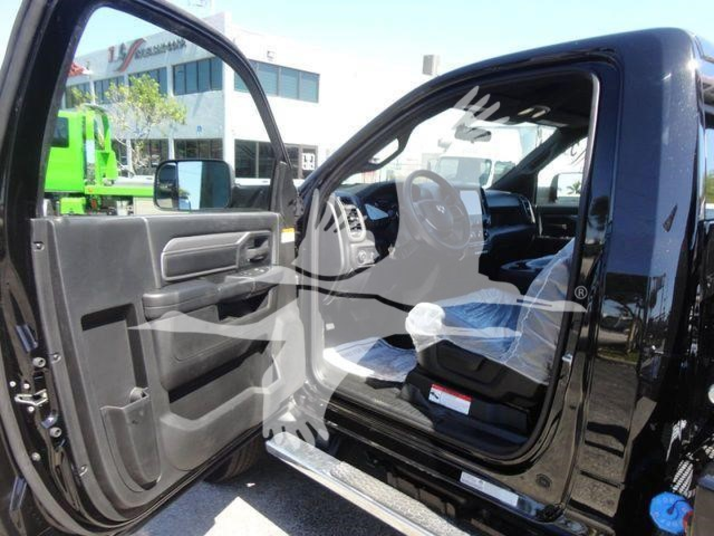 Ram 5500 SLT truck cab interior with door open showing front seat and dashboard