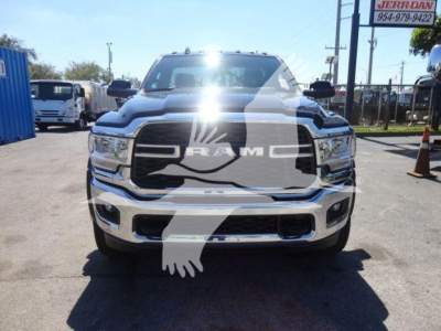 Ram 5500 front view showing grille and bumper with RAM emblem and chrome accents.