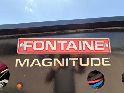 Fontaine Magnitude MAG55H trailer rear logo plate with Fontaine badge and Magnitude text.