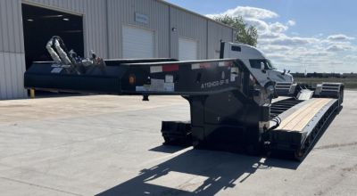 Lowboy trailer showing A110HDG-SF-18" LDH model with long deck, black frame, and gooseneck-style hitch.