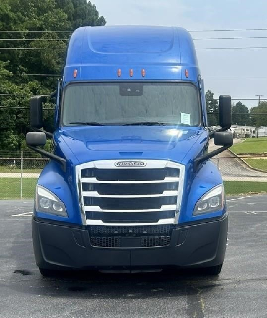 Front view of a blue 2022 Freightliner Cascadia 126 sleeper truck showing grille, headlights, and large windshield.