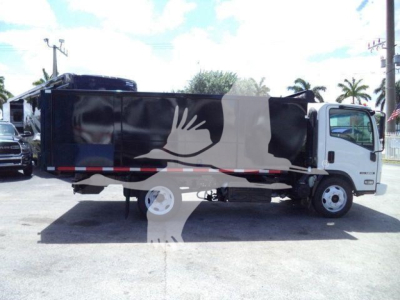 Isuzu NPR/NRR dump truck side view showing cargo bed and cab with black tarp cover.