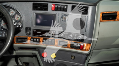 Kenworth T680 interior dash showing center touchscreen, wood trim, HVAC controls, gauges, and steering wheel.