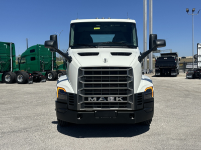 Front view of a white 2027 Mack AN64T conventional daycab truck showing bold grille, headlights, and large side mirrors.
