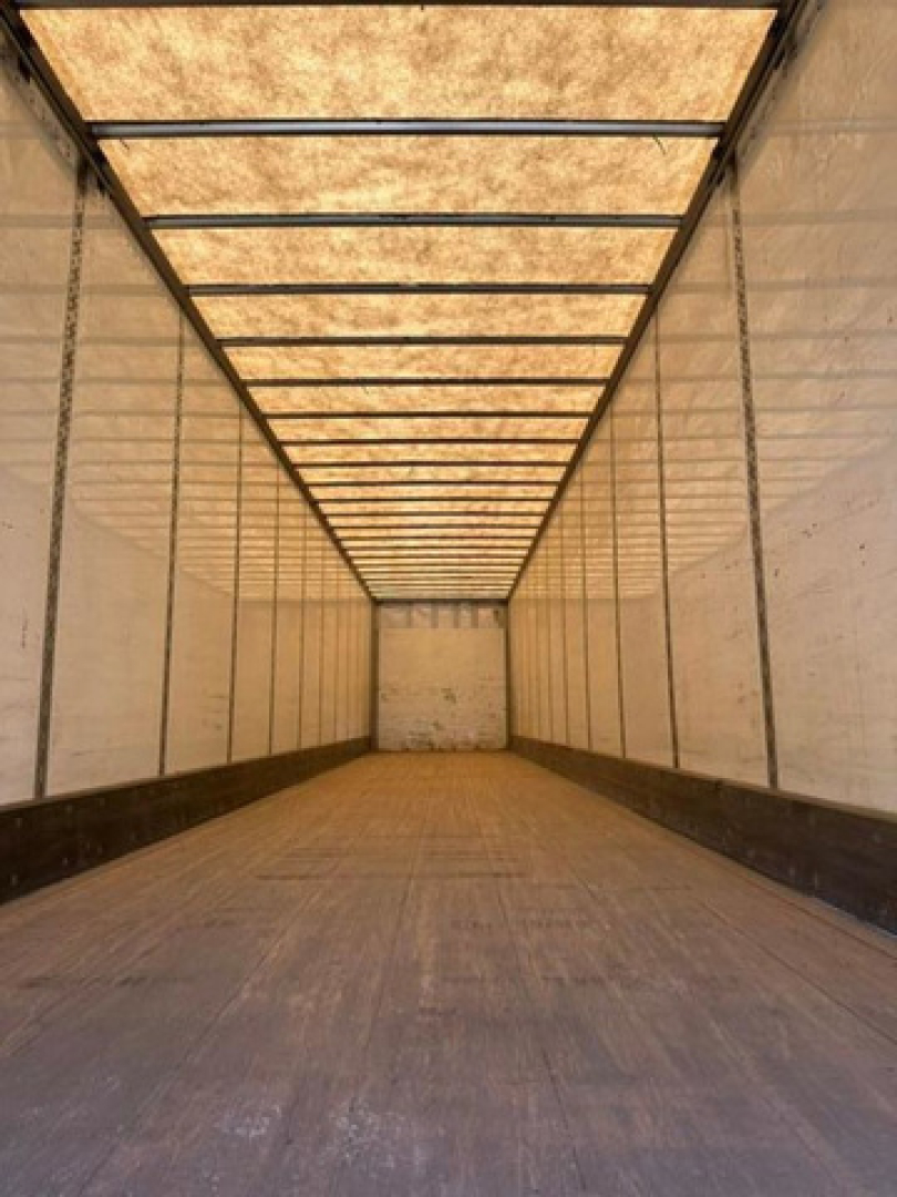 Wabash van interior trailer empty cargo area showing longitudinal ceiling beams and side walls