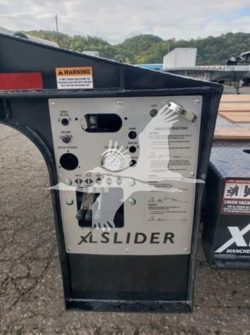 XL Specialized XL80SA trailer wheel-well control panel with labels and gauge showing XlSlider branding.