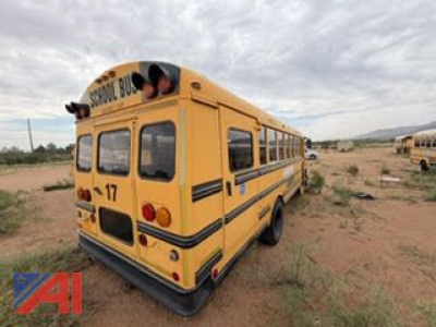 Rear view of a yellow 2007 Freightliner FS65 school bus showing bus body and rear lights.