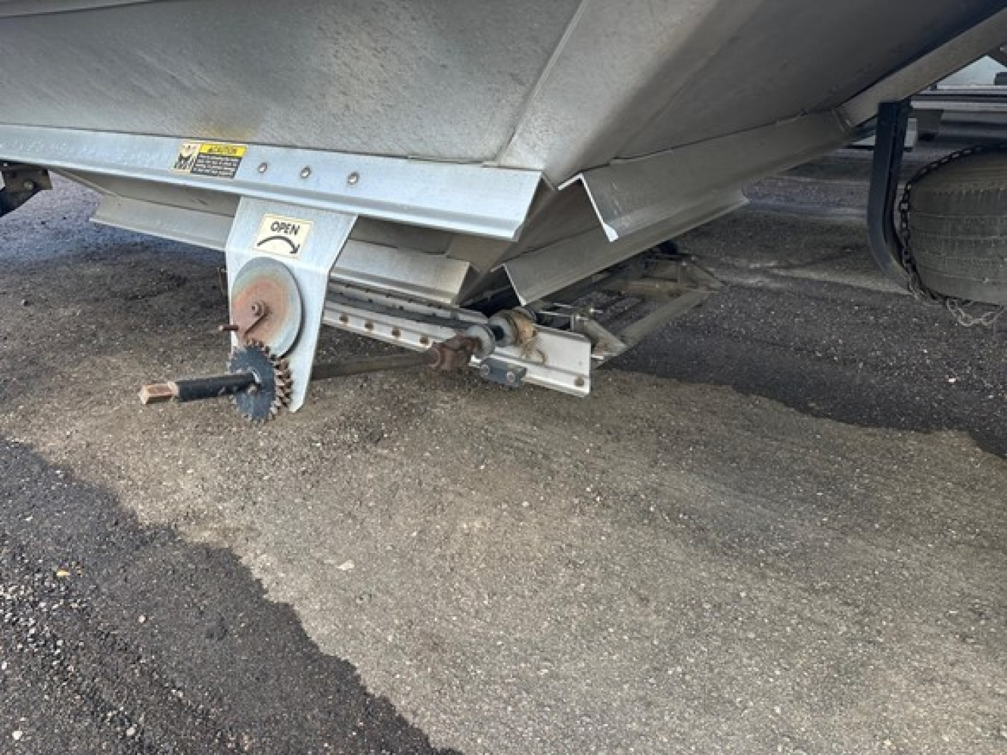 Trailer hitch and undercarriage of a 2010 Wilson Pacesetter hopper trailer showing the hitch assembly and support frame.