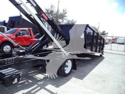 Isuzu NRR roll-off truck with lift equipment showing cargo bed and hydraulic arms; no legible text visible on labels or decals.