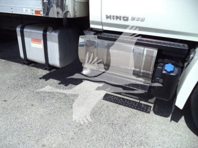 Truck side view showing fuel tanks and chrome step guard on a 2015 Hino 268A refrigerated truck.