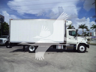 Used 2015 Hino 268A refrigerated truck side view showing box body and cab; no legible small text visible on exterior