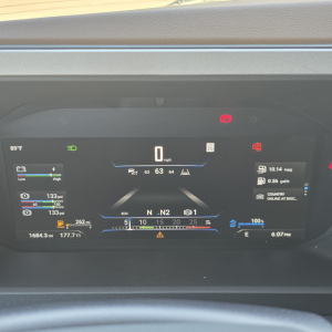 Dashboard of a 2027 Mack PR64T76M truck showing digital instrument cluster and various readouts.