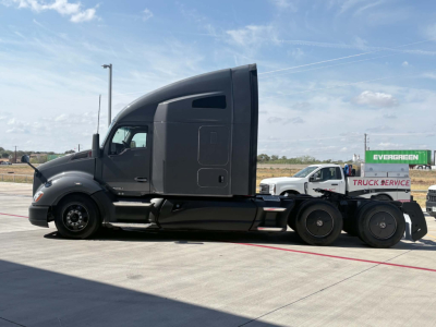 Kenworth T680 tractor in profile view showing sleeper cab and rear axle configuration.