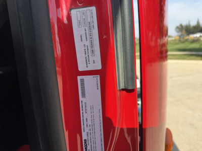 Kenworth T680 door jamb label with VIN and stock number visible.