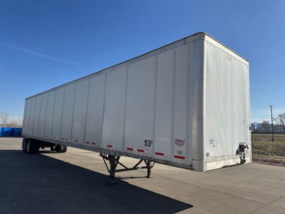 Trailer: 53' dry van trailer in view with front and side showing rear hitch and landing gear. Text on side includes 53', Wabash logo, and small decals.