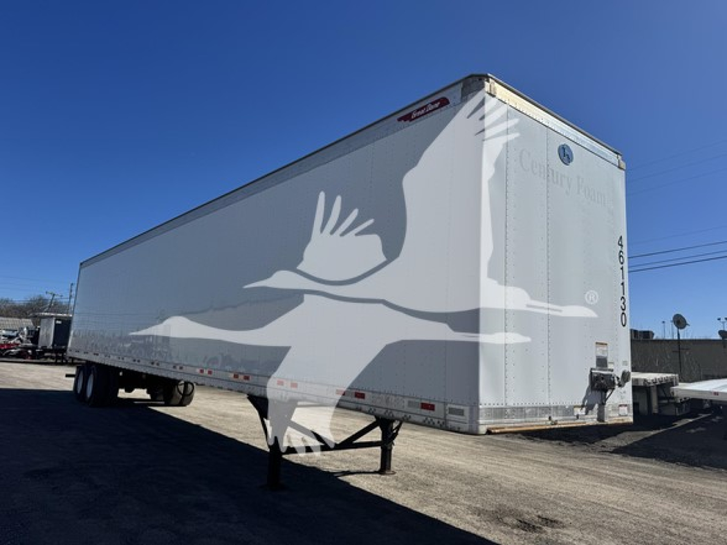 Great Dane sheet and post dry van trailer showing side graphic and rear doors. Visible VIN tag area and trailer frame details.