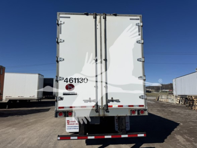Great Dane dry van trailer rear view showing doors, hinges, and reflective tape with stock number 4611130 and signature logo.