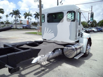 Kenworth T270 rollback truck cab and chassis showing side fuel tank and exhaust